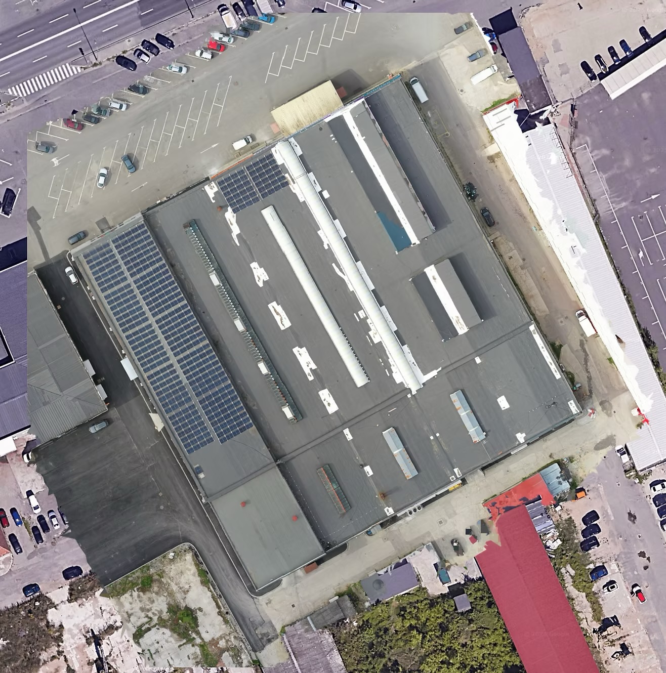 Aerial orthomosaic of an industrial roof with solar panels